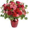 Tres belle! Ruby red roses and delicate pink alstroemeria are mixed with