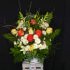 This sympathy floor basket is the perfect mix of the more traditional
