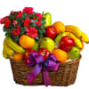 Fruit meets flowers in this delicious arrangement! Brightened by a potted azalea