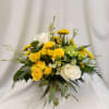 A charming arrangement of yellow spray roses, white roses, and yellow daisies.