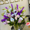 The Standing Ovation bouquet from Bella Floral LV is a striking and