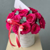 Introducing our Hat Box of Hot Pink Roses, a symbol of bold