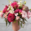 PINK FUSION
This design is filled with roses, lisianthus, spray roses and dianthus