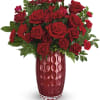 Resplendent in red! Filled with Valentine&#039;s Day blooms, this stunning glass vase