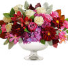 A chic spin on the traditional fall arrangement, this luxurious bouquet of