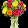 Bright, happy blooms for every day worth celebrating! Our new arrangement is