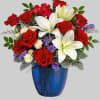 Revel in the crisp, classic color scheme of white lilies and radiant