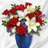 Revel in the crisp, classic color scheme of white lilies and radiant