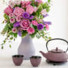 Pretty as a picture, this perfect purple arrangement spoils your someone special