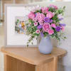 Pretty as a picture, this perfect purple arrangement spoils your someone special