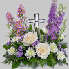 Soft and serene, this artistic array of cream and lavender blooms around