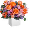 Cheerful as can be, this whimsical arrangement of orange and peach blooms