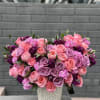 This arrangement in pink and light purple shades is gentle, feminine, charming.