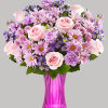 Just like a daydream. Our delightful lavender arrangement is gathered with accents