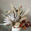Fall pumpkin with dried flowers