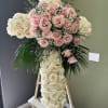 Huge Cross Shaped arrangement with roses and some fillers. 