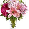 Make her blush with this romantic mix of fragrant lilies and lush