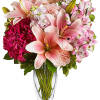 Make her blush with this romantic mix of fragrant lilies and lush