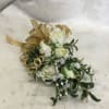 Hand made wrislet or corsage with baby rose which may change to