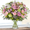 Celebrate any occasion with this charming garden floral arrangement! With a charm