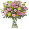 Celebrate any occasion with this charming garden floral arrangement! With a charm