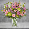 Celebrate any occasion with this charming garden floral arrangement! With a charm