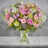 Celebrate any occasion with this charming garden floral arrangement! With a charm