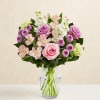 Celebrate any occasion with this charming garden floral arrangement! With a charm