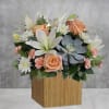 Sleek meets sweet! This modern arrangement pairs a sculptural succulent with soft