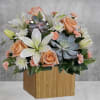 Sleek meets sweet! This modern arrangement pairs a sculptural succulent with soft