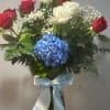 This bold bouquet of hydrangea and roses is a versatile tribute on