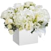 What a beautiful white flower arrangement. Great for any occasion.

DETAILS
Beautiful white roses
