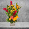 With a tropical beauty all its own, our tropical arrangement brightens every