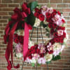 just a beautiful lush wreath with hydrangea, roses,and orchids.  Customize in