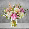 Bursting with bright pink and white peonies, this delightful mix is sure