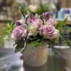 This angelic arrangement is as cute as it is pretty. Featuring the