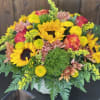 This vivid autumn bouquet captures the essence of the season, featuring a