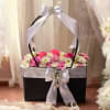 This Beautiful black and white handbag includes Pink roses, white spray roses