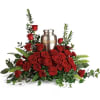 Elegant red roses and delicate greenery are a breathtaking way to display