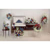 Proud and patriotic, this collection of seven hand-made sympathy pieces honors a