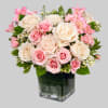 Celebrate a special day with this sweet treat of radiant roses in