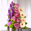 Sophisticated and refined, this stunning, artistic flower arrangement has a modern appeal