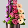 Sophisticated and refined, this stunning, artistic flower arrangement has a modern appeal