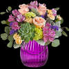 Straight out of a storybook, this enchanting arrangement is right at home