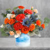 One of a kind! This standout mix of bold orange roses and