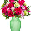 Springtime perfection! Celebrate the season with pretty pink and pale green blooms