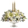 Celebrate the season with this majestic centerpiece of sparkling silver and glamorous