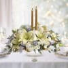 Celebrate the season with this majestic centerpiece of sparkling silver and glamorous