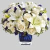 Like gazing into a clear blue sky, this serene arrangement soothes the