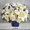 Like gazing into a clear blue sky, this serene arrangement soothes the